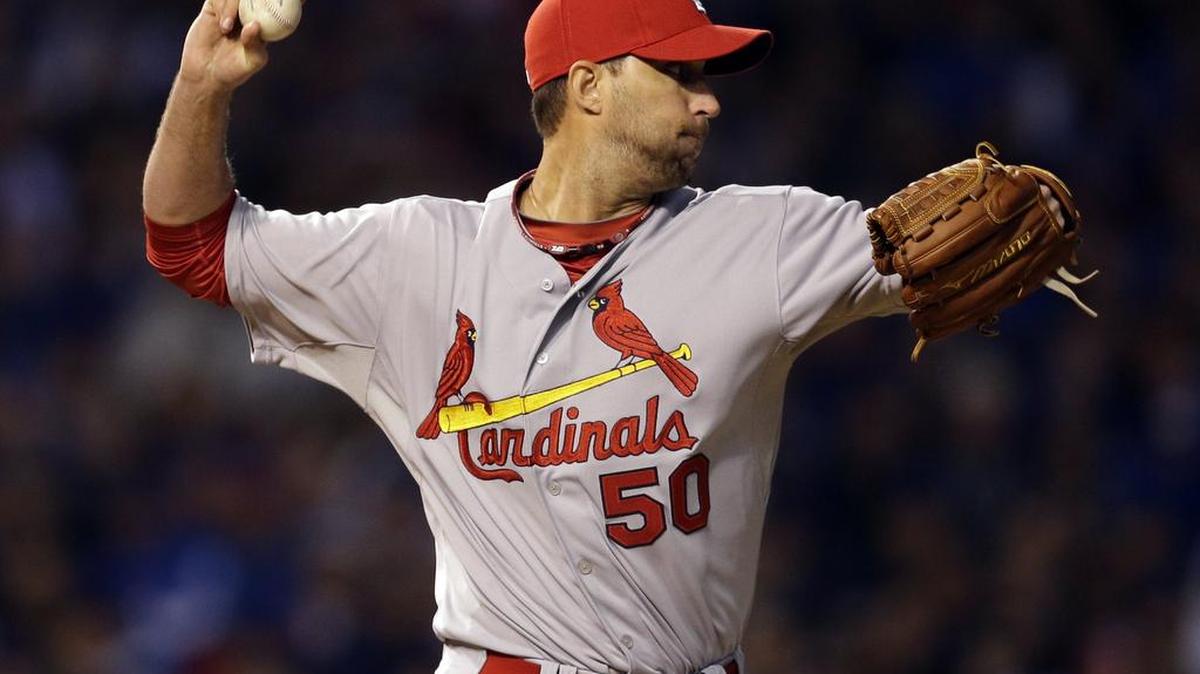 St. Louis Cardinals starter Adam Wainwright throws in a game against the Chicago Cubs on April 5, 2015. Wainwright was selected to receive the Fred Hutchinson Award on Monday.