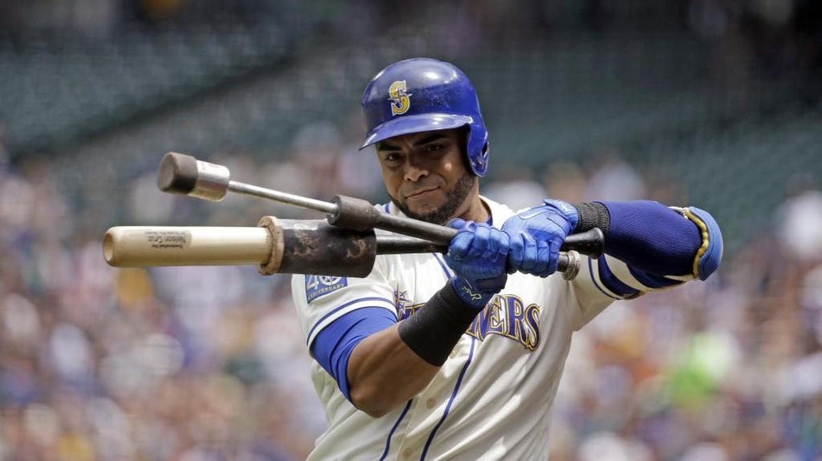 Nelson Cruz, shown warming up on Sunday at Safeco Field, has hit 103 homers in two-and-a-half seasons with the Mariners.