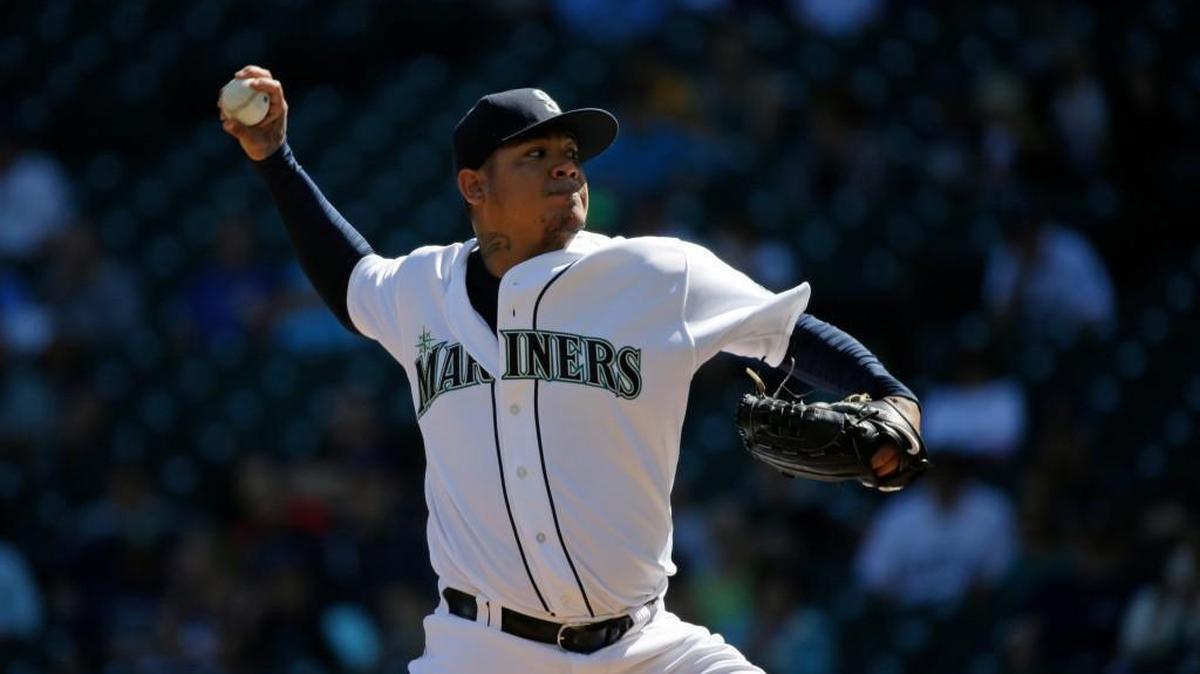 
Seattle Mariners starting pitcher Felix Hernandez throws against the Texas Rangers in the first inning of a baseball game, Thursday, Sept. 10, 2015, in Seattle.
