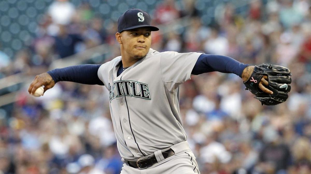 
Seattle Mariners starting pitcher Taijuan Walker delivers to the Minnesota Twins during the first inning Friday. Walker allowed just one hit as the Mariners snapped a four-game losing streak. 
