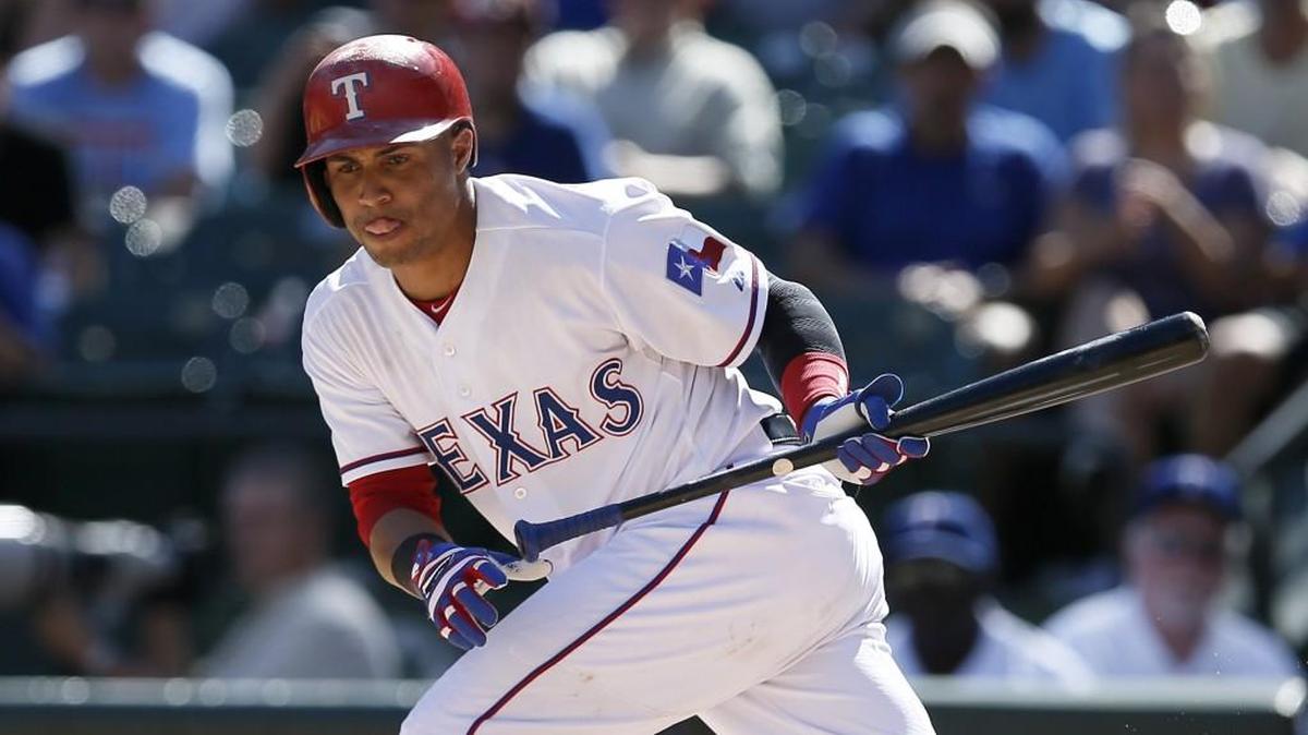 The Rangers’ Leonys Martin sprints after a bunt attempt during an interleague game against the San Diego Padres this past season. The Mariners acquired Martin to help solidify some of their outfield issues.