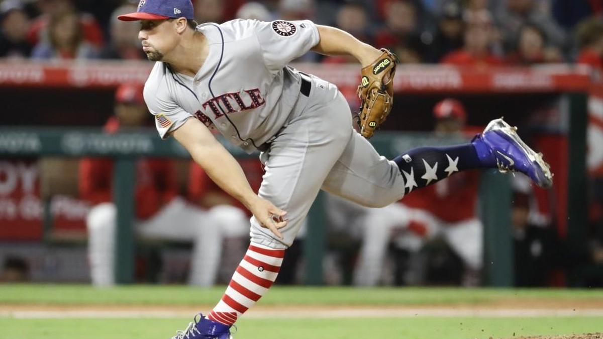 Seattle Mariners relief pitcher Dan Altavilla, shown pitching on Saturday against the Angels, is headed back to Triple-A.