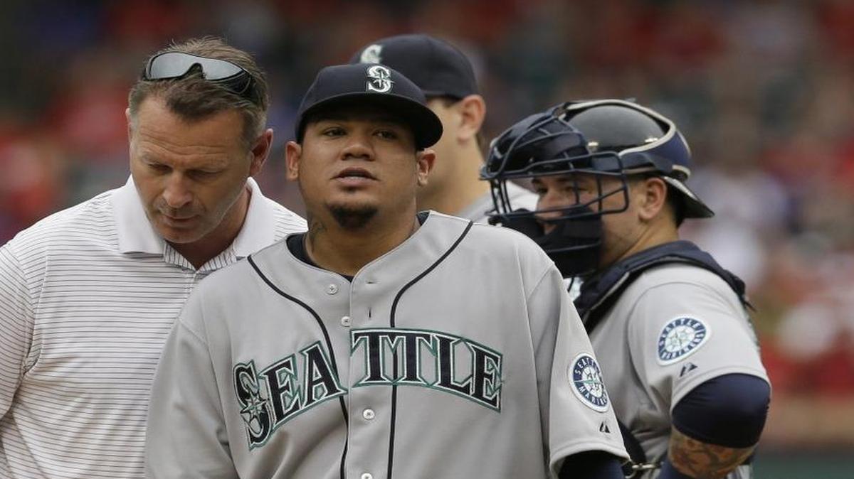 
Stiffness in his pitching elbow is one of the contributing factors that led to the Seattle Mariners shutting down starting pitcher Felix Hernandez, right.
