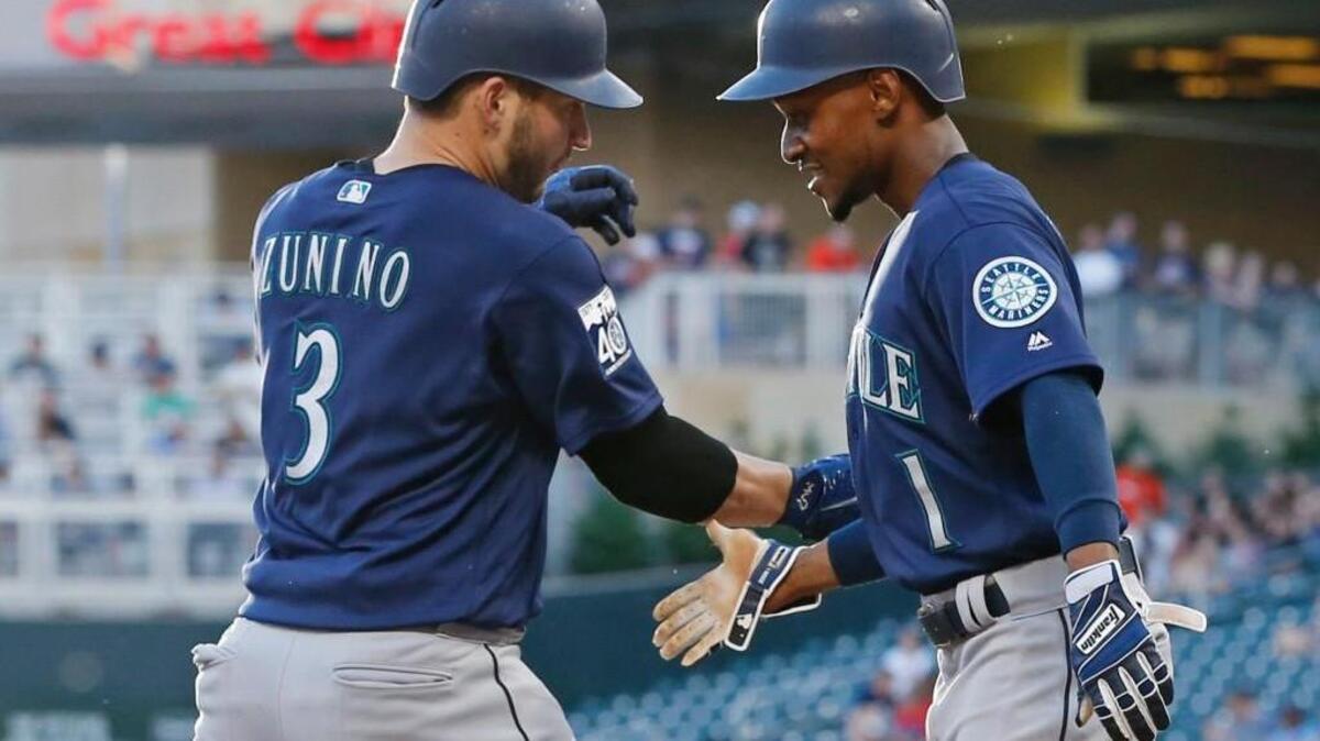 Mike Zunino got a smiling welcome from Jarrod Dyson after hitting a three-run homer in the third inning.