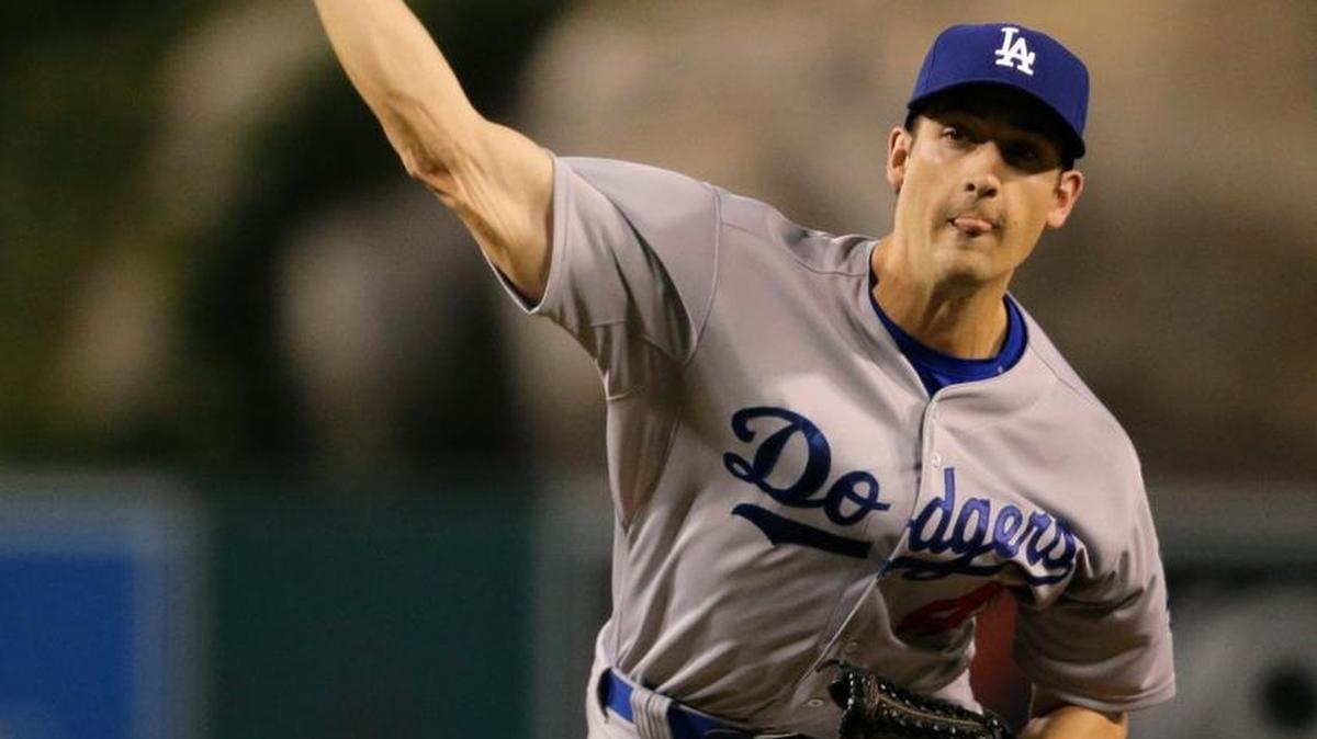 The Mariners acquired right-hander Joe Wieland on Tuesday from the Dodgers in a trade for minor-league infielder Erick Mejia.