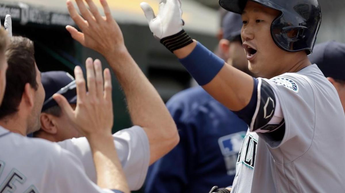 Dae-Ho Lee hit two home runs Wednesday in helping the Mariners rally after Oakland knocked out an ineffective Felix Hernandez.