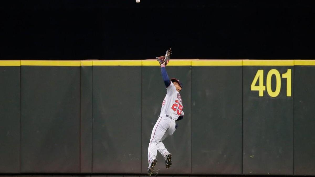Minnesota center fielder Byron Buxton took extra bases away from Robinson Cano with a leaping two-out catch in the fifth inning with runners at first and third.