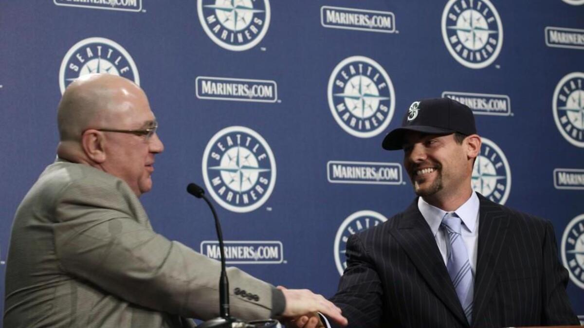 
In this file photo from 2010, first baseman Casey Kotchman is introduced by then Seattle Mariners general manager Jack Zduriencik.
