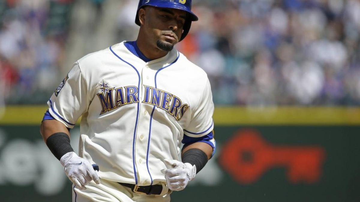 Seattle Mariners' Nelson Cruz rounds the bases after hitting a solo home run in the seventh inning of a baseball game against the Chicago White Sox, Sunday, May 21, 2017, in Seattle.