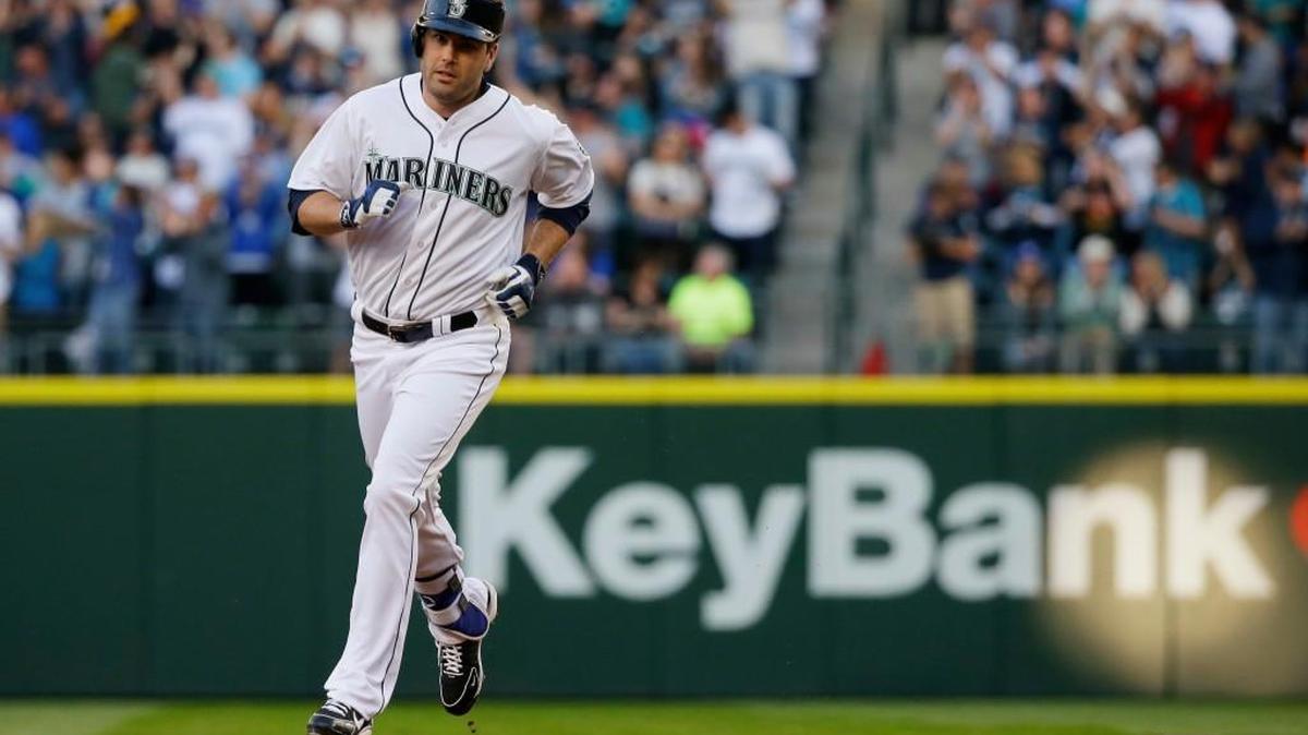 Seattle Mariners' Seth Smith rounds the bases after he hit a solo home run against the Kansas City Royals during the first inning of a baseball game, Saturday, April 30, 2016, in Seattle.