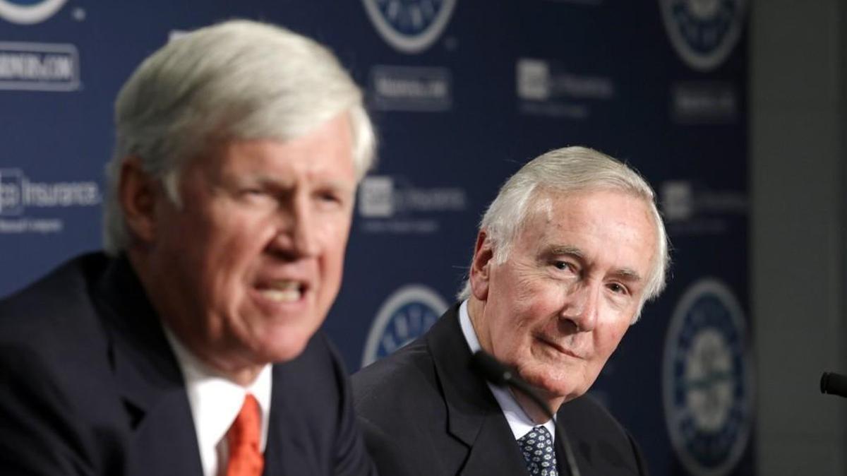 John Stanton, left, who would become the Seattle Mariners' chairman and chief executive officer, speaks during a news conference as current Chairman Howard Lincoln looks on Wednesday, April 27, 2016, in Seattle. Nintendo of America plans to sell its controlling stake in the Mariners to a group of minority owners led by Stanton. Lincoln announced the intended transaction, along with his plan to retire from day-to-day oversight of the franchise. The ownership change is subject to approval by Major League Baseball, which the club hopes to get during league meetings in August.