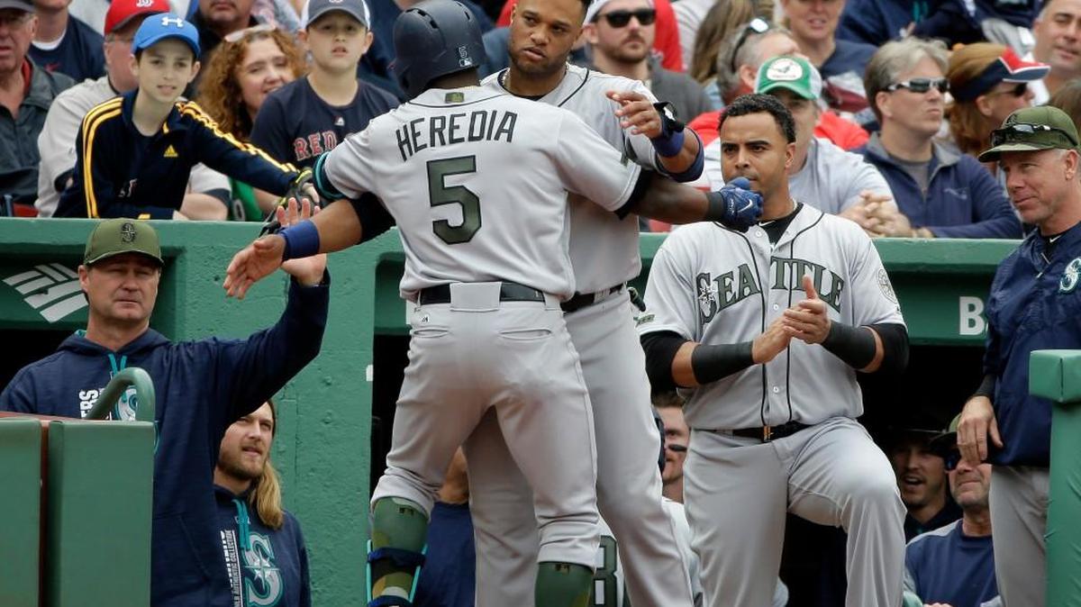 Guillermo Heredia and Robinson Cano hit home runs Sunday for the Mariners in a 5-0 victory at Boston.