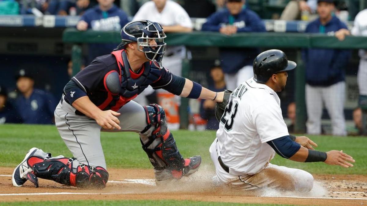 Nelson Cruz was thrown out at home Thursday in the first inning when tagged by Cleveland catcher Chris Gimenez. But Cruz later threw out a runner at the plate from right field.