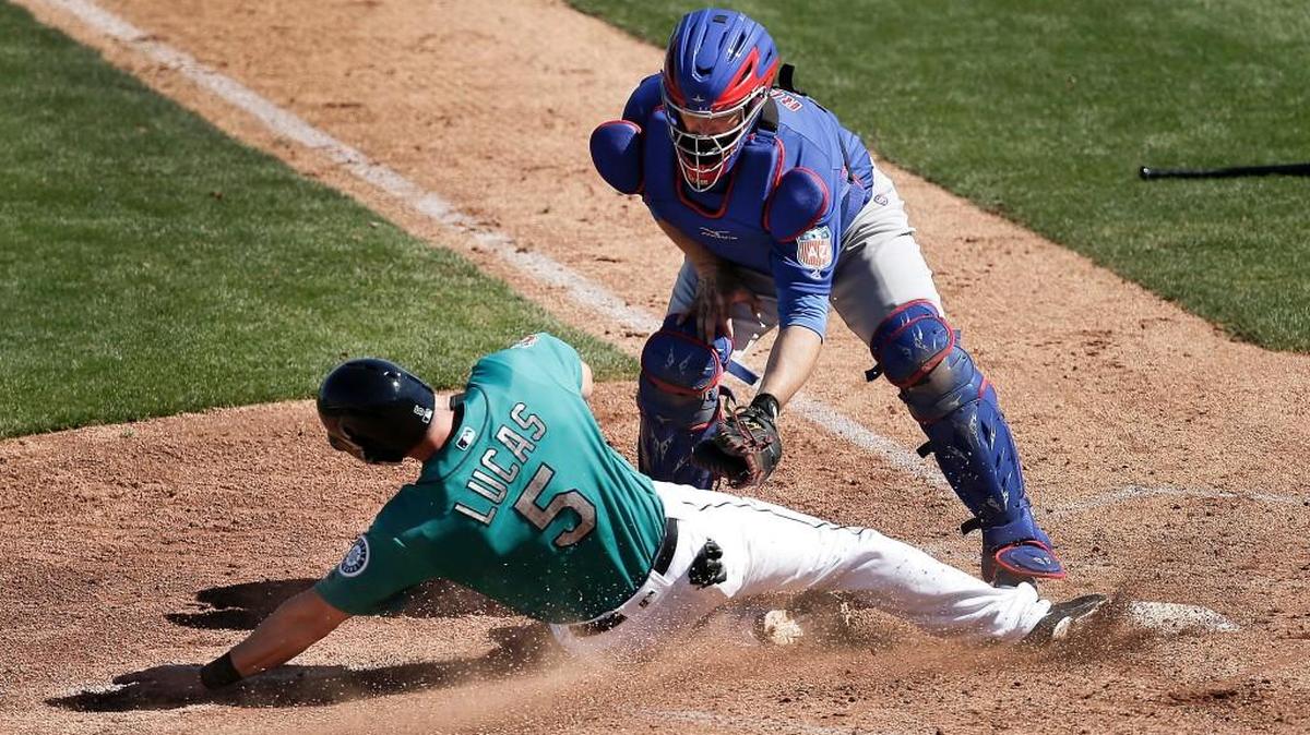 Ed Lucas scored from second base on an RBI single by Luis Sardinas in the second inning of the Mariners’ 10-8 victory over the Chicago Cubs.