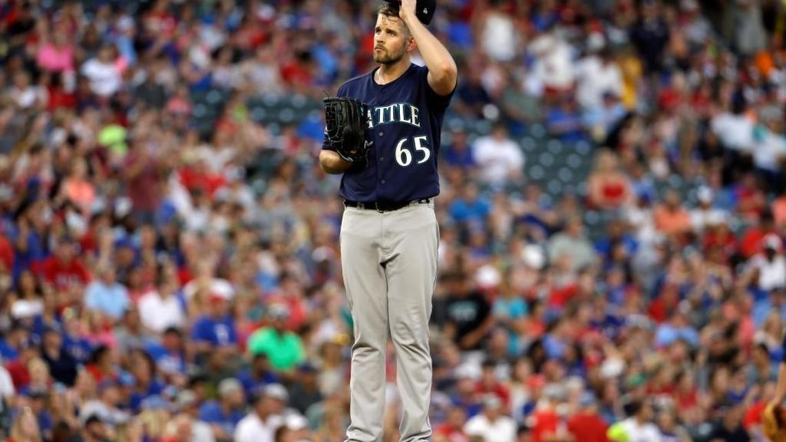 Rangers rough up Paxton in easy victory over Mariners