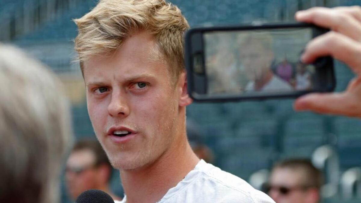 Right-handed pitcher Sam Carlson, the Mariners’ second-round pick, watched his new organization take batting practice Tuesday night at Target Field.