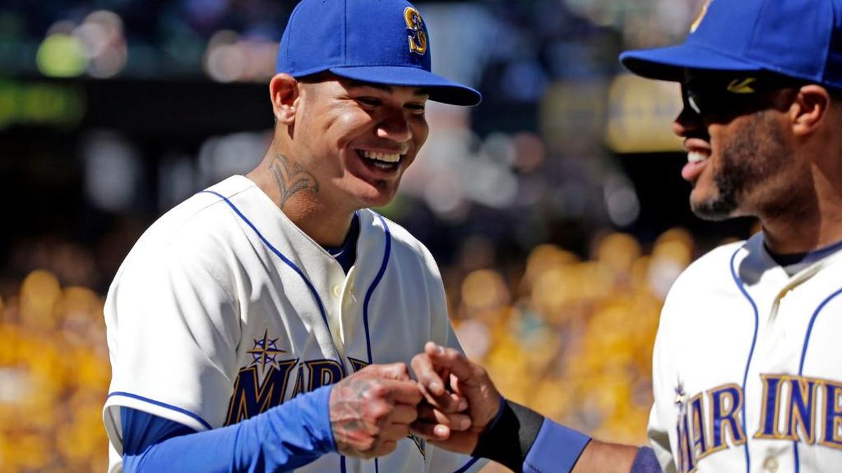 Much of the Mariners’ payroll last season went to Felix Hernandez (left) and Robinson Cano. Each made $24 million.