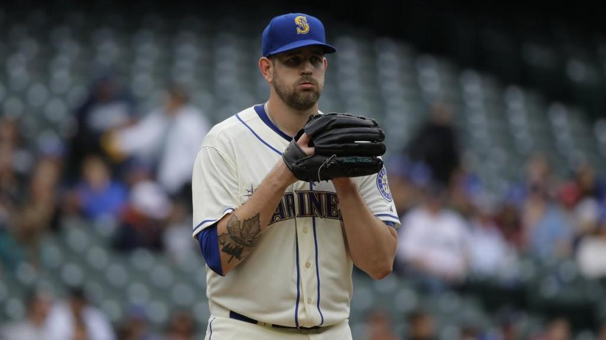 Seattle Mariners pitcher James Paxton stands on the mound during a baseball game against the Colorado Rockies, Sunday, Sept. 13, 2015, in Seattle.