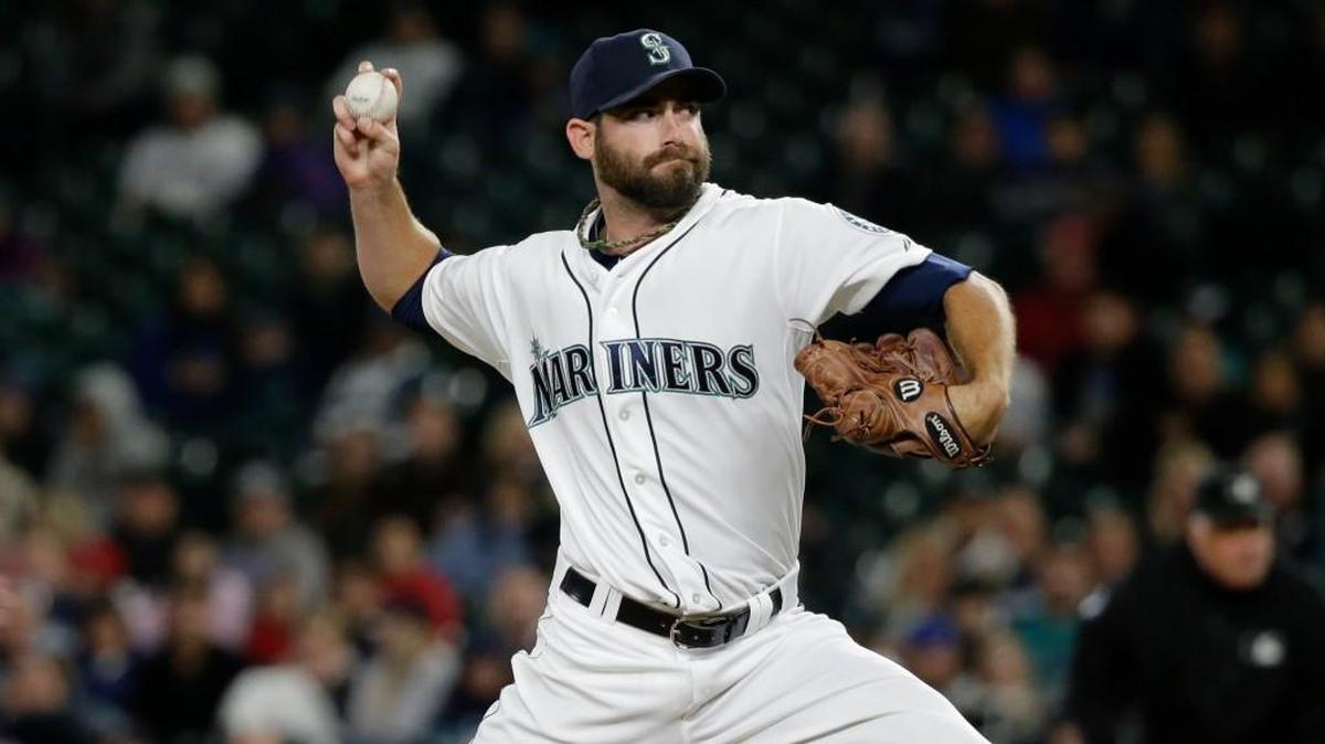 Reliever Tony Zych returned Tuesday to Seattle after being diagnosed with tendinitis in his right rotator cuff.