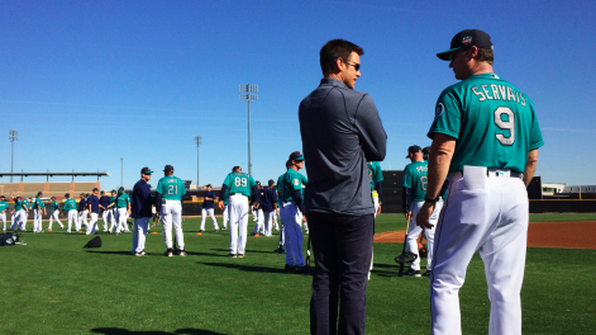 General manager Jerry Dipoto (left) and manager Scott Servais are seeing positive early results in the Control the Zone philosophy.