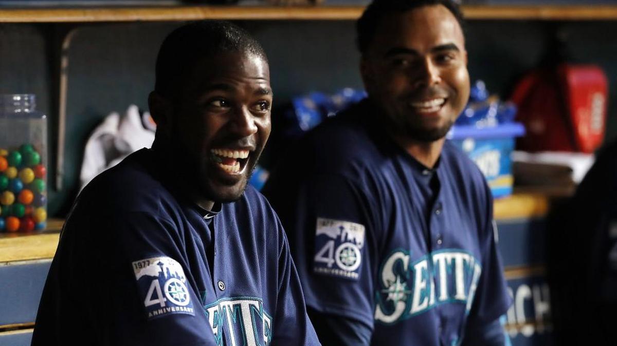 Guillermo Heredia (left) and Nelson Cruz each hit home runs Wednesday in the Mariners’ 8-0 victory at Detroit.
