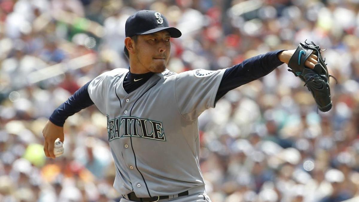 
Seattle Mariners starting pitcher Hisashi Iwakuma delivers to the Minnesota Twins on Aug. 2.

