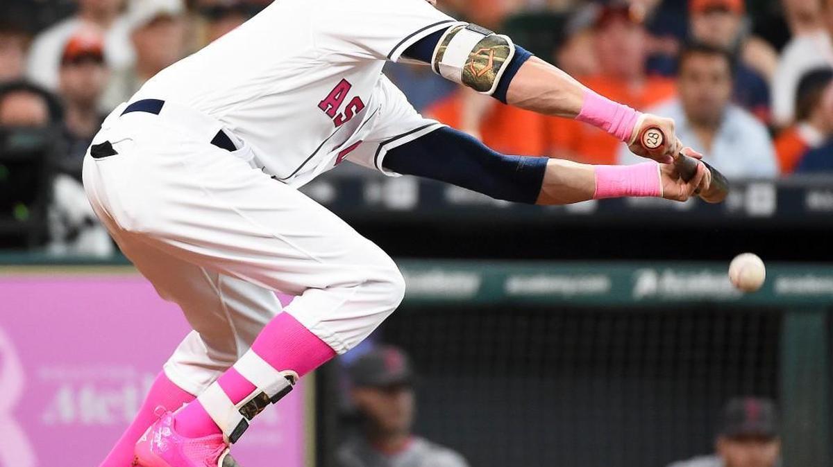 A bunt single by Colby Rasmus with two outs and two strikes fueled Houston’s two-run third inning.