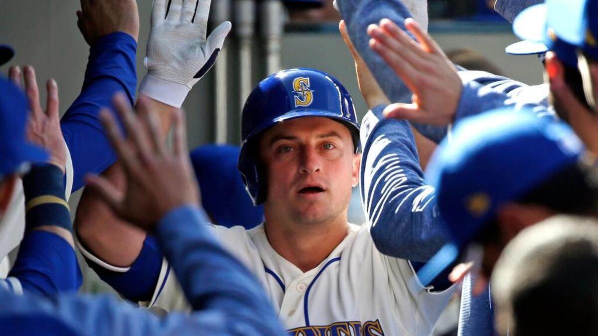 Kyle Seager is congratulated after his solo homer gave the Mariners a 4-3 lead against Texas in the eighth inning Sunday. The Rangers led 3-0 entering the bottom of the seventh. The Mariners wrapped up the week by winning four of six games against the Rangers and Angels.
