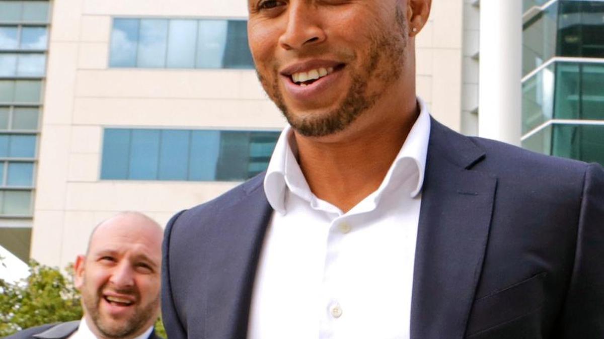 Mariners outfielder Leonys Martin exited the federal courthouse Tuesday in Miami with his attorney Paul Minoff. Martin arrived Wednesday in Arizona in time to take part in the Mariners’ workout.