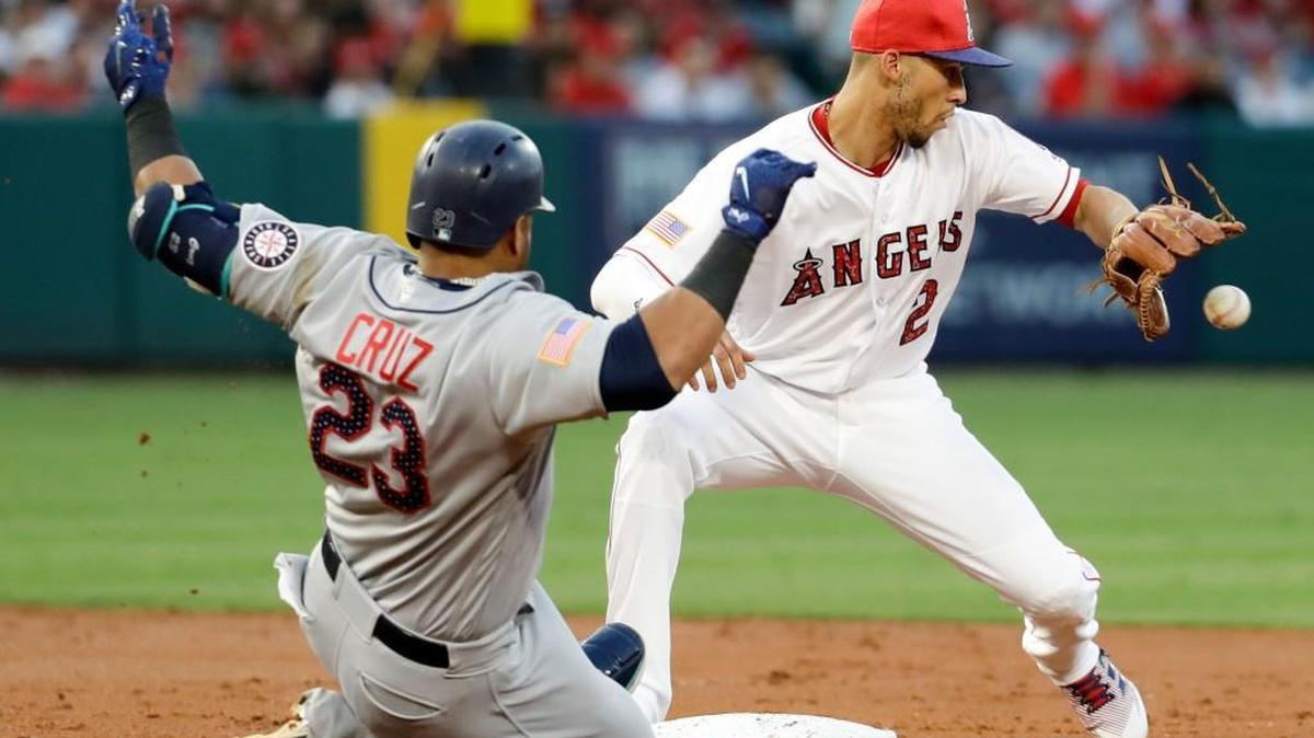 Nelson Cruz suffered an injury to his right knee on a slide at second base Saturday night against the Angels. Shortstop Andrelton Simmons took the throw from center fielder Cameron Maybin and applied the tag for the out.