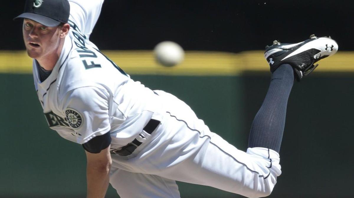 Seattle Mariners starting pitcher Charlie Furbush throws against the Oakland Athletics on Aug. 3.