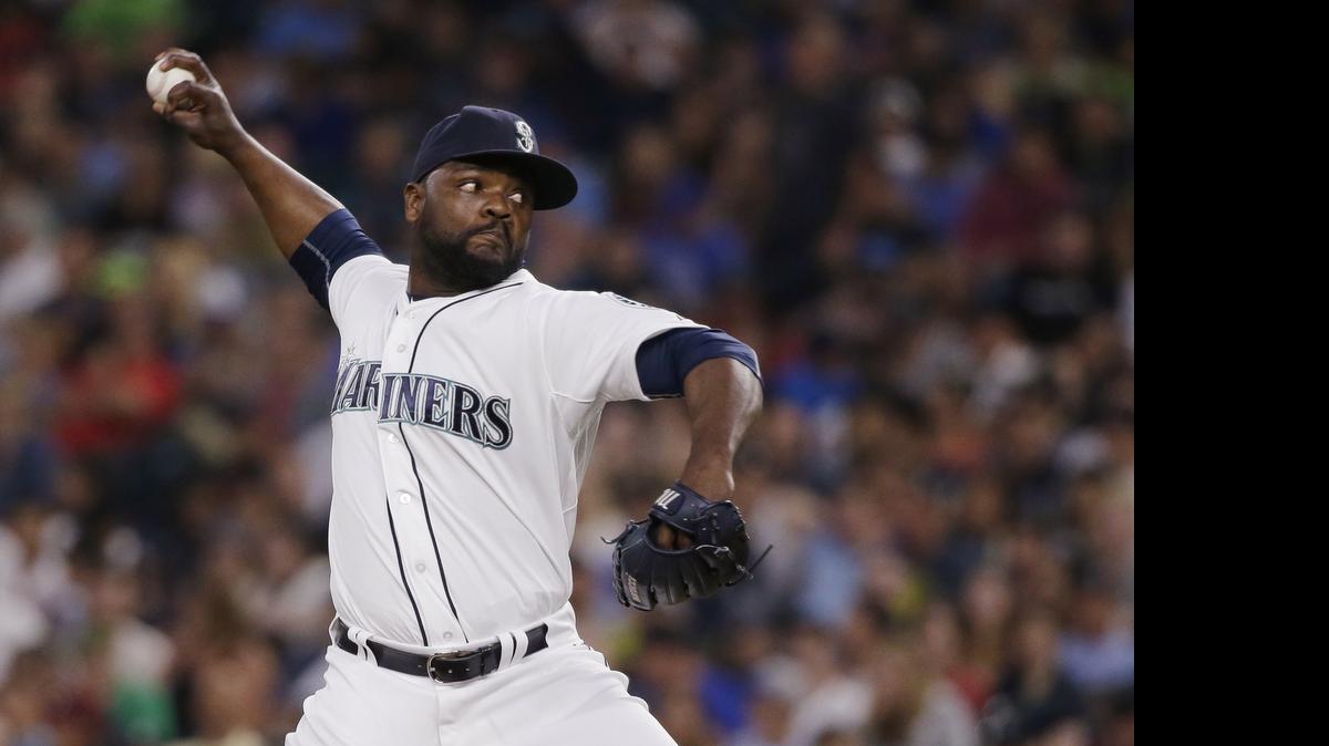 
Seattle Mariners relief pitcher Fernando Rodney throws against the Detroit Tigers on July 7. The Mariners believe Rodney — who led the majors in saves last season but has struggled in 2015 — has been tipping his pitches.
