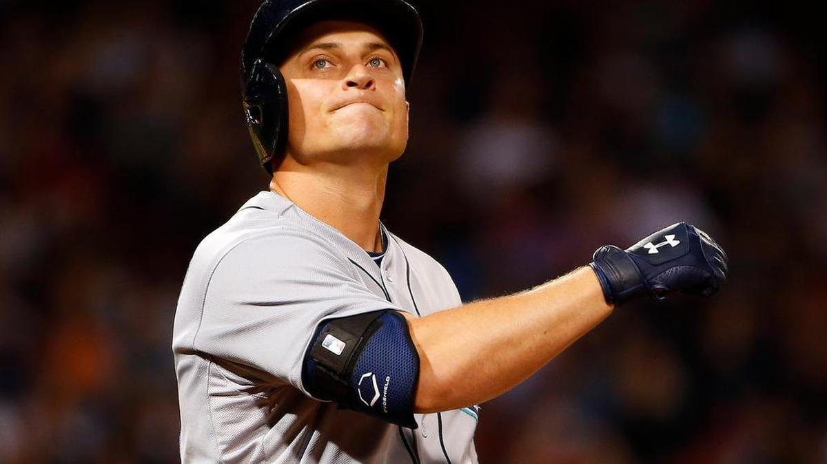 
Seattle Mariners' Kyle Seager reacts after flying out against the Boston Red Sox during the third inning of a baseball game at Fenway Park in Boston Friday, Aug. 14, 2015.
