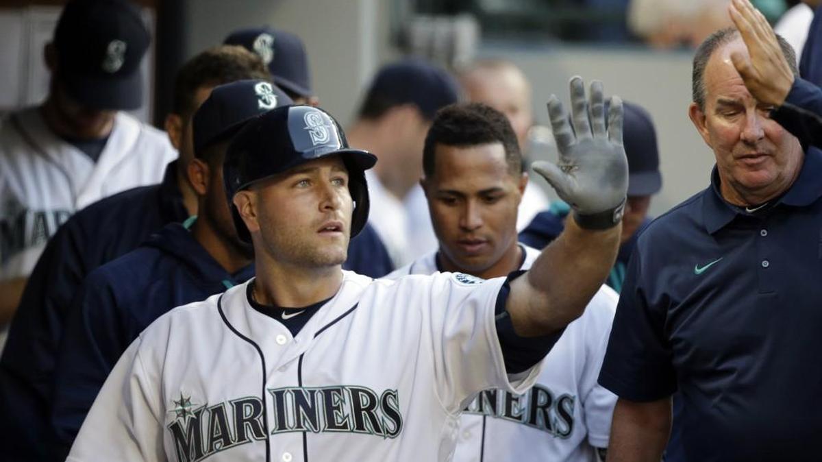 Seattle Mariners’ Chris Iannetta is congratulated on his home run against the Oakland Athletics in a baseball game Saturday, April 9, 2016, in Seattle.