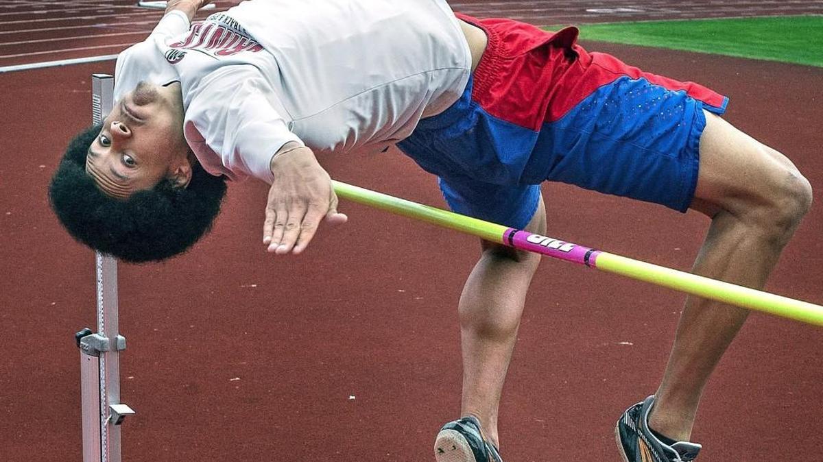 Saint Martin’s University high jumper Mikel Smith practices on campus March 25, 2015.