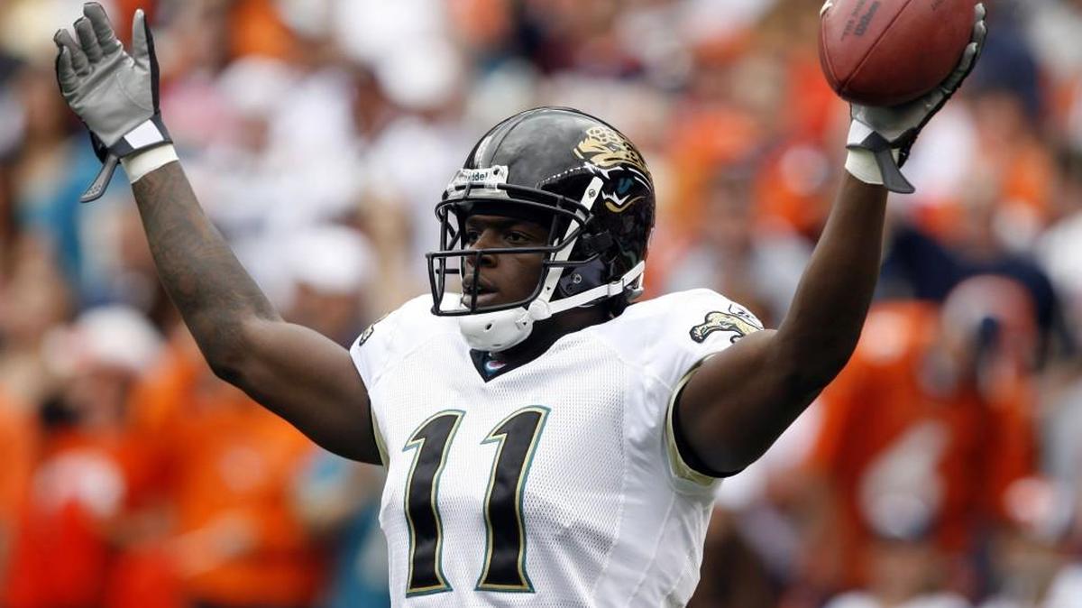Jacksonville Jaguars wide receiver Reggie Williams celebrates his touchdown catch against the Denver Broncos in the second quarter of the Jaguars' 24-13 victory in a football game in Denver on Sunday, Sept. 23, 2007.