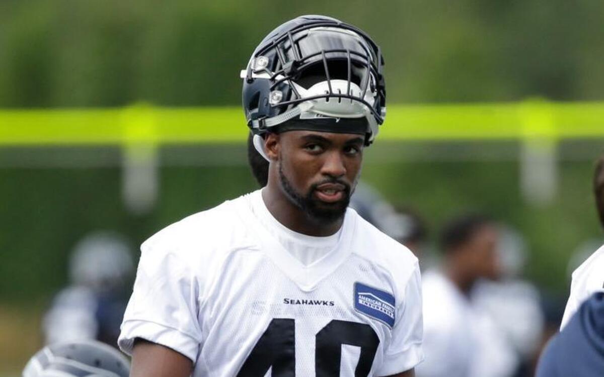 Seattle Seahawks' Tyvis Powell walks on the field during the team's NFL football training camp Saturday, July 30, 2016, in Renton.