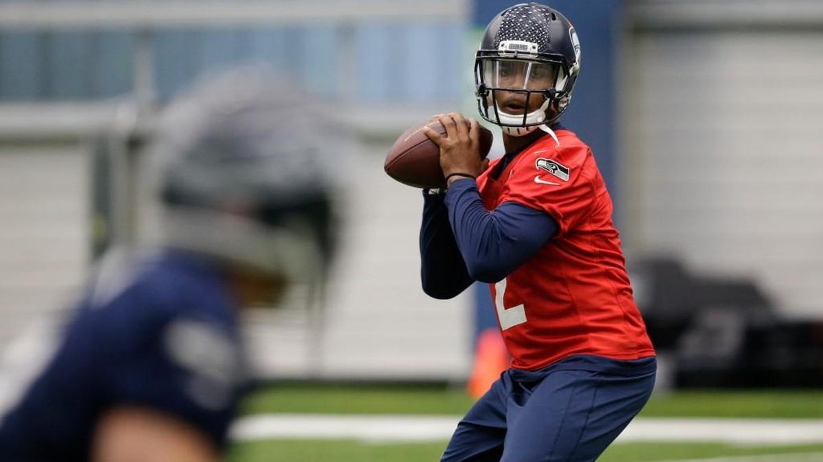 Seattle quarterback Trevone Boykin passes during a rookie minicamp workout on Sunday in Renton. Boykin, who signed as an undrafted free agent, says his playing style is very similar to Russell Wilson and he hopes to learn a lot from the Seahawks’ starting quarterback.