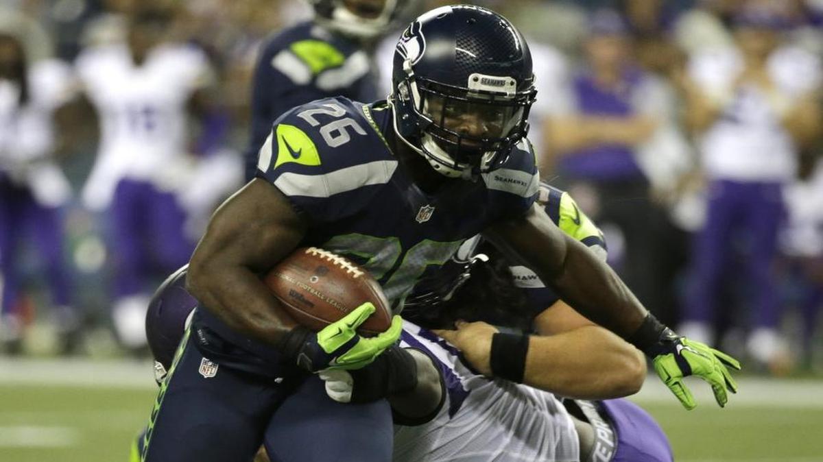 Seattle Seahawks running back Troymaine Pope runs the ball against the Minnesota Vikings during a preseason NFL football game, Thursday, Aug. 18, 2016, in Seattle.