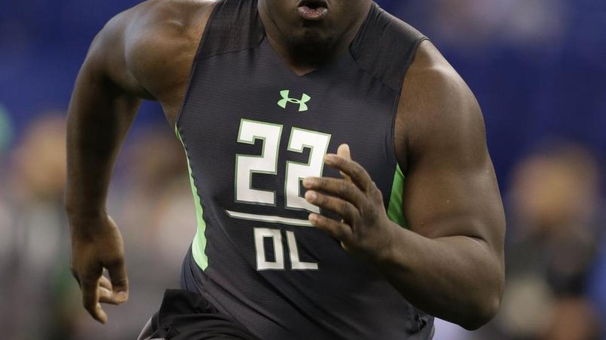 Texas A&M offensive lineman Germain Ifedi runs a drill at the NFL football scouting combine in February.