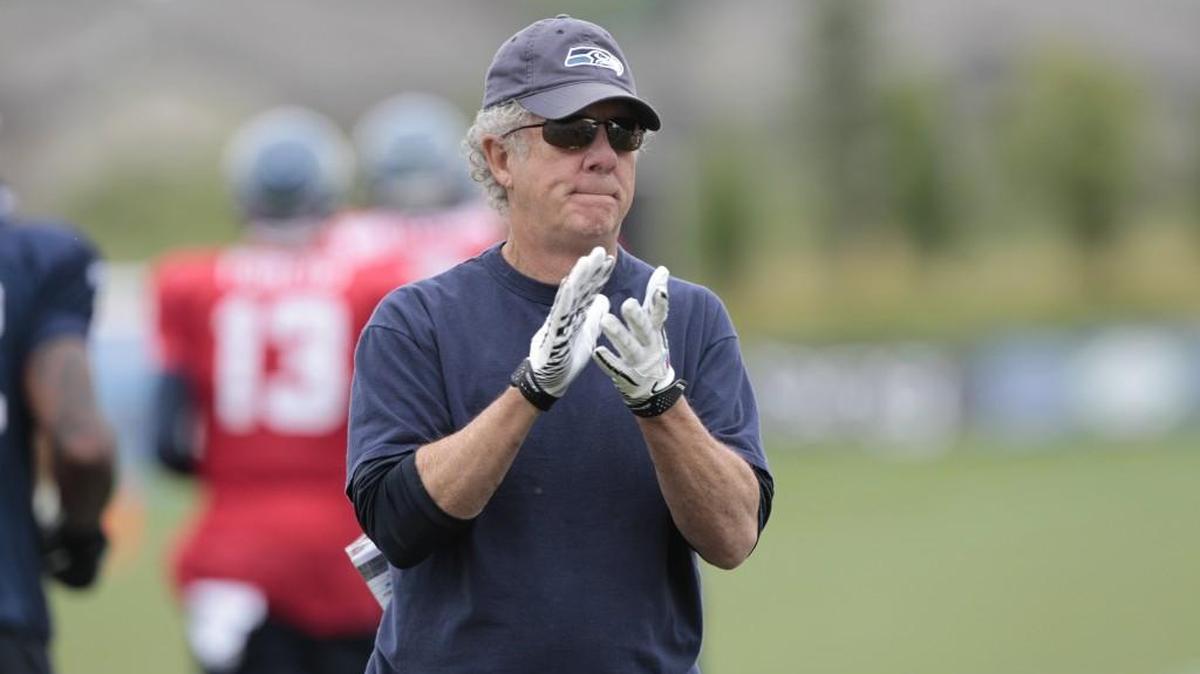 Seahawks quarterbacks coach Carl Smith helps coach Pete Carroll decide if he should challenge calls during games.