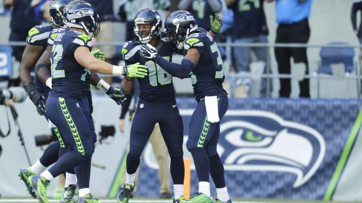 
Seahawks wide receiver Tyler Lockett (16) celebrates with teammates after returning a kickoff 105 yards for a touchdown on Sunday against Chicago. Lockett leads the NFL in kickoff return average (34.3 yards), is sixth in punt return average (13.4), and is the only player to score a touchdown in both phases.
