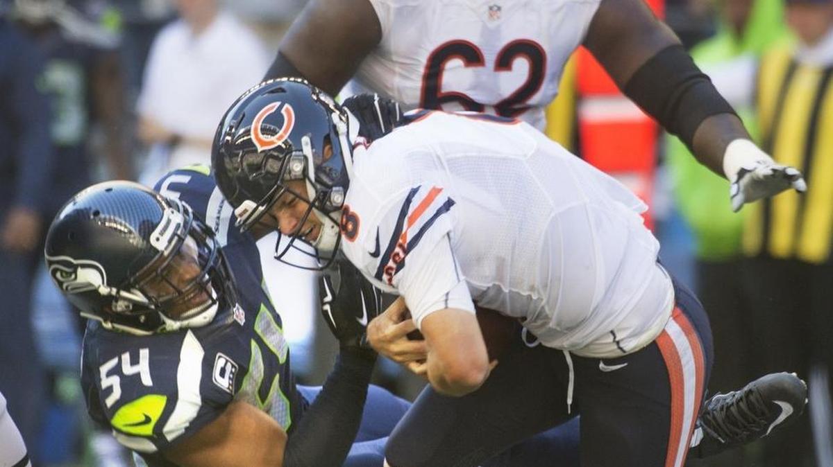Seahawks linebacker Bobby Wagner sacks then-Bears quarterback Jimmy Clausen. Clausen, who oversaw 10 punts in Seattle in September, may start for the Ravens on Sunday.