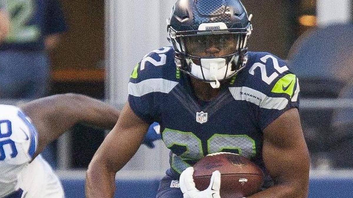 Seattle running back C.J. Prosise runs in the second quarter Thursday against Dallas at CenturyLink Field . Prosise played in the first half, spelling starter Christine Michael on third down