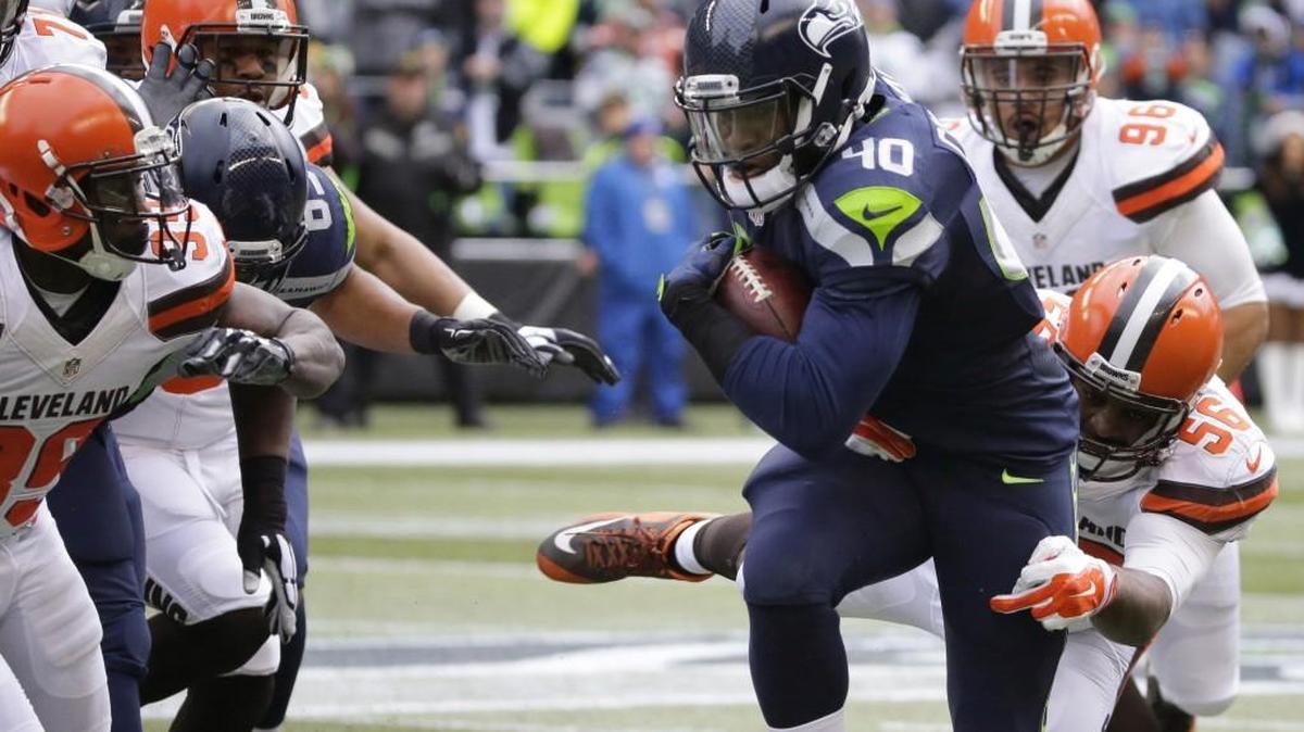 Seattle Seahawks fullback Derrick Coleman rushes against the Cleveland Browns earlier this season. Coleman was involved in an October automobile crash that has him facing two felony charges.
