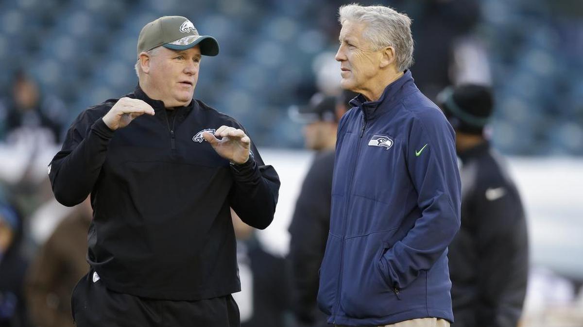 Seahawks coach Pete Carroll, left, says of Chip Kelly, right: “I think his story is well-documented — he’s had a lot of success and he’s done a lot of good things. You can see the turnaround (with the 49ers). They look really good.”