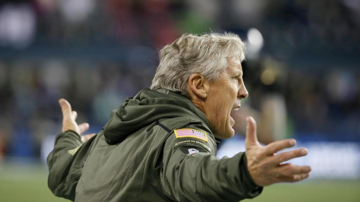 Seattle head coach Pete Carroll protests a call in the second half of a game against Arizona on Sunday, Nov. 15, 2015, in Seattle.
