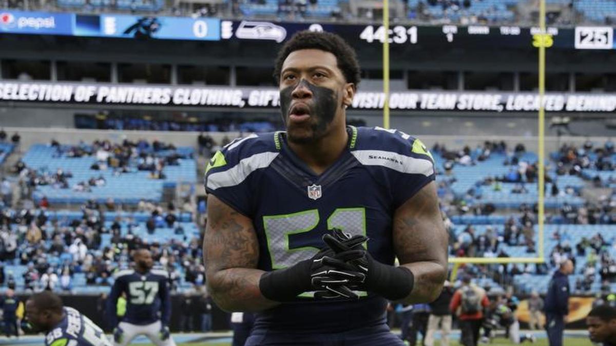 Seattle’s Bruce Irvin warms up before the NFL divisional playoff game against the Panthers. The linebacker, who is now a free agent, said on Monday he wants to remain with the Seahawks.
