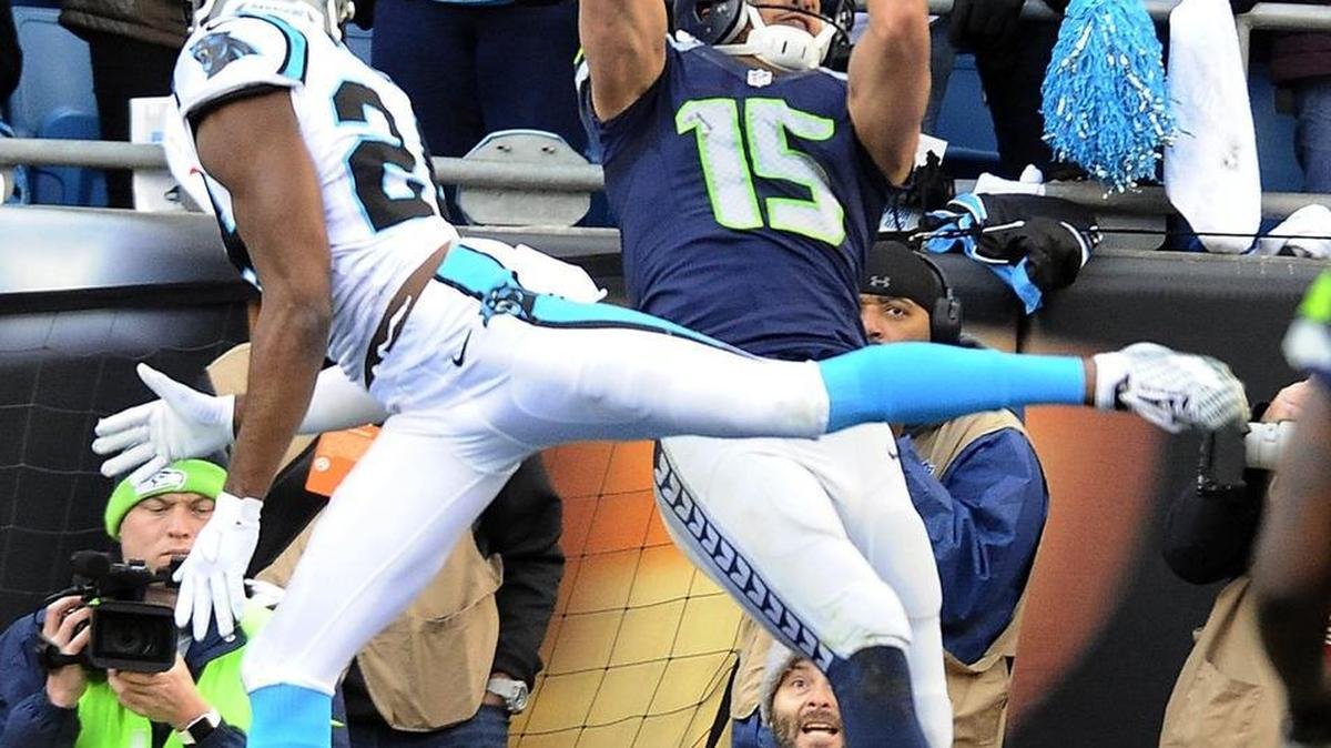 Seahawks wide receiver Jermaine Kearse from Lakewood catches a touchdown pass over Carolina’s Josh Norman (24) late in Seattle’s season-ending loss at the Panthers in January. Kearse is unlikely to remain with Seattle; he’s more likely to get too rich an offer elsewhere in free agency that starts next week.