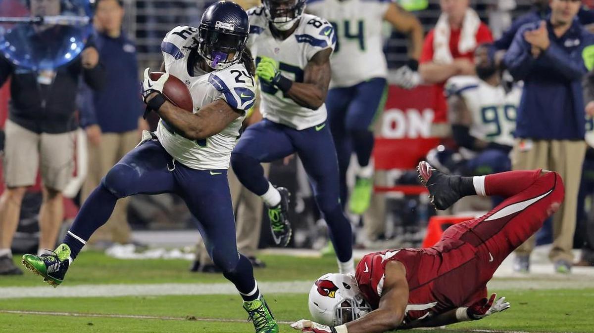 The last time Marshawn Lynch played Arizona he ran over Cardinals for two touchdowns, including a memorable, 79-yard one on which defenders bounced off him. He missed practice Friday with an abdomen injury, but coach Pete Carroll expects Lynch to play Sunday night against Arizona.